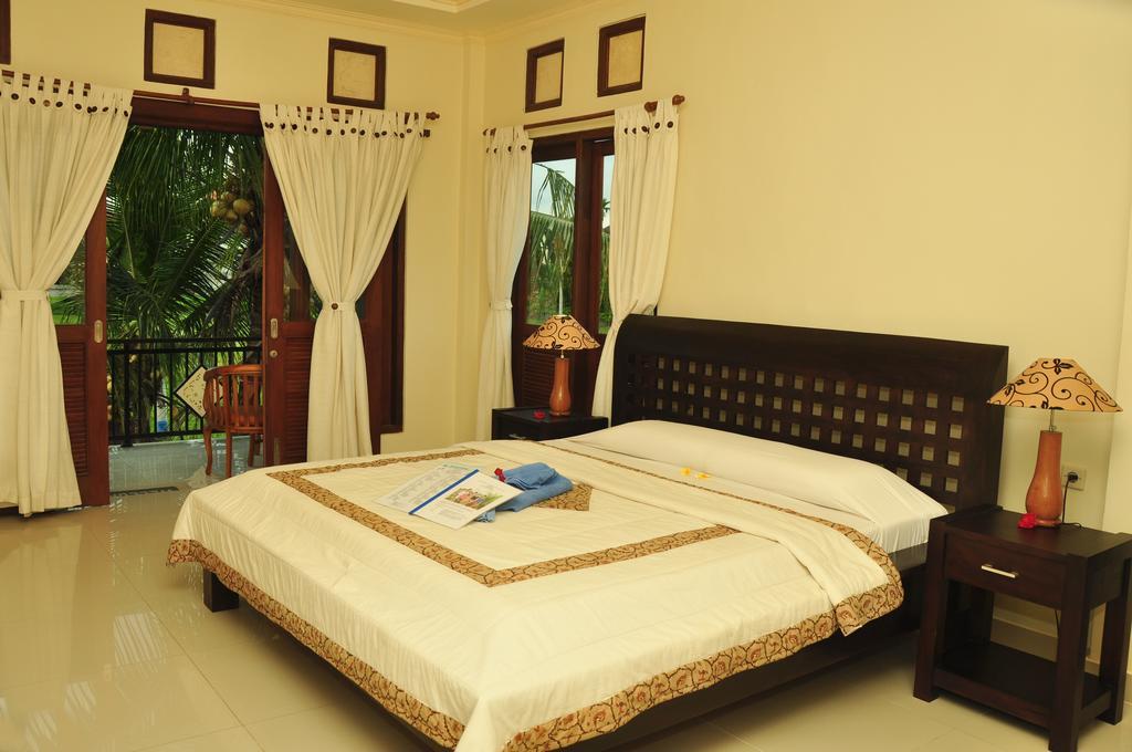 Three Dewi'S Guest House Ubud Rum bild